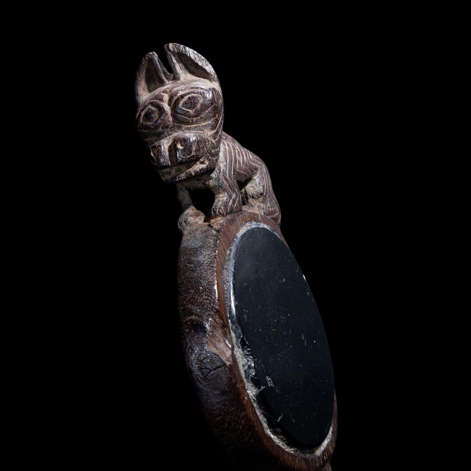 A Chancay Wood and Anthracite Mirror