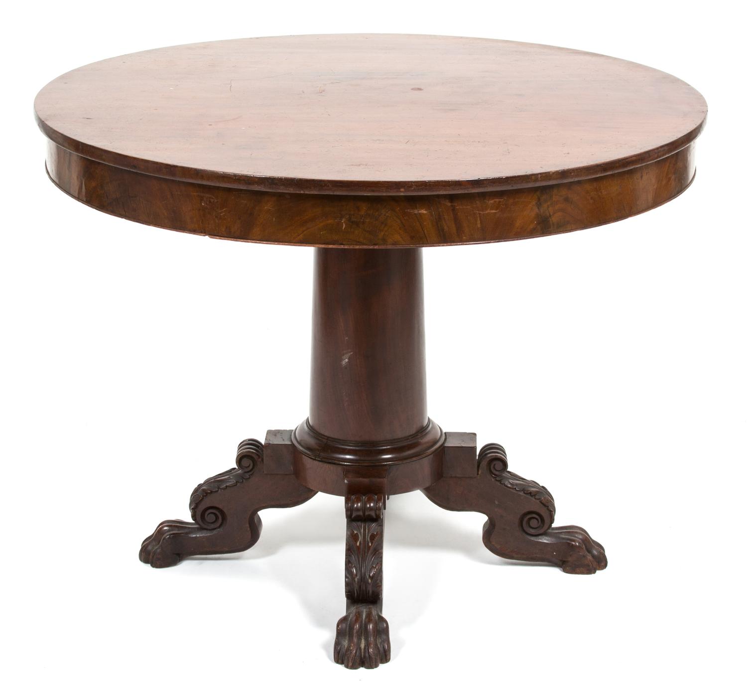 An American Empire Mahogany Tilt Top Table Height 27 1/2 inches x diameter 36 1/2 inches. — 19TH CENTURY