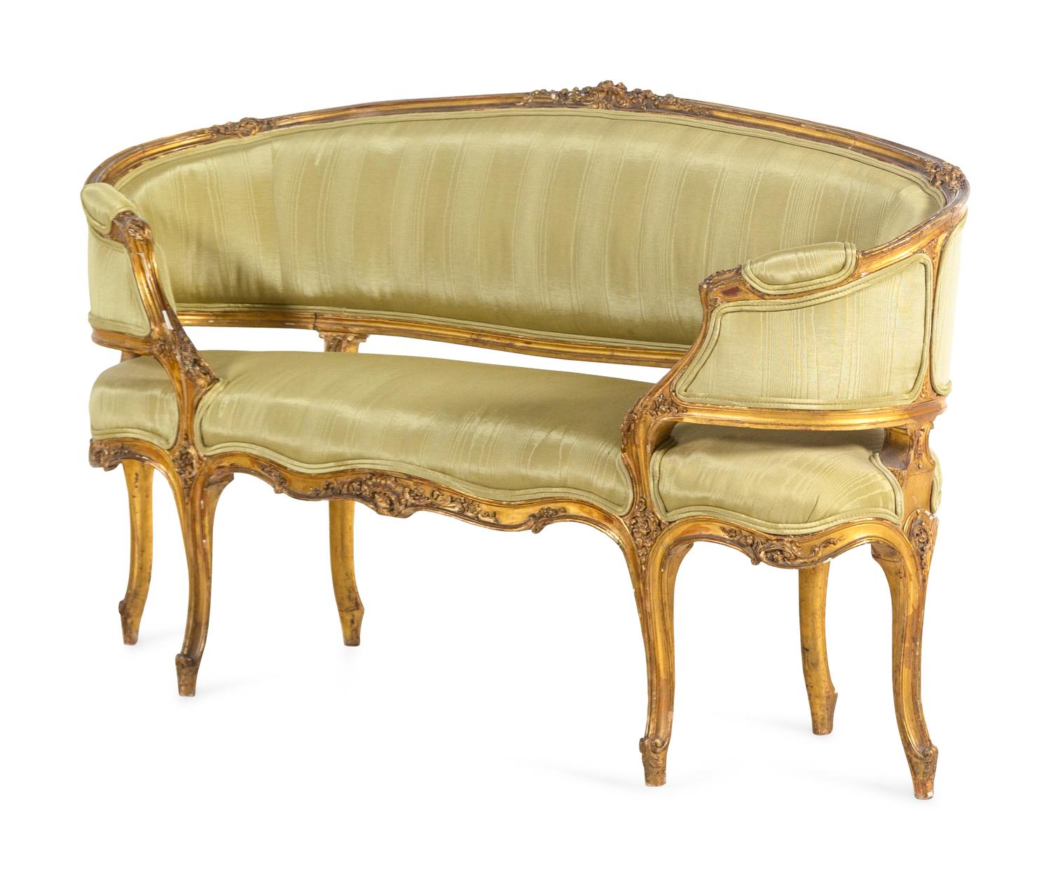 A Louis XV Style Carved Giltwood Settee