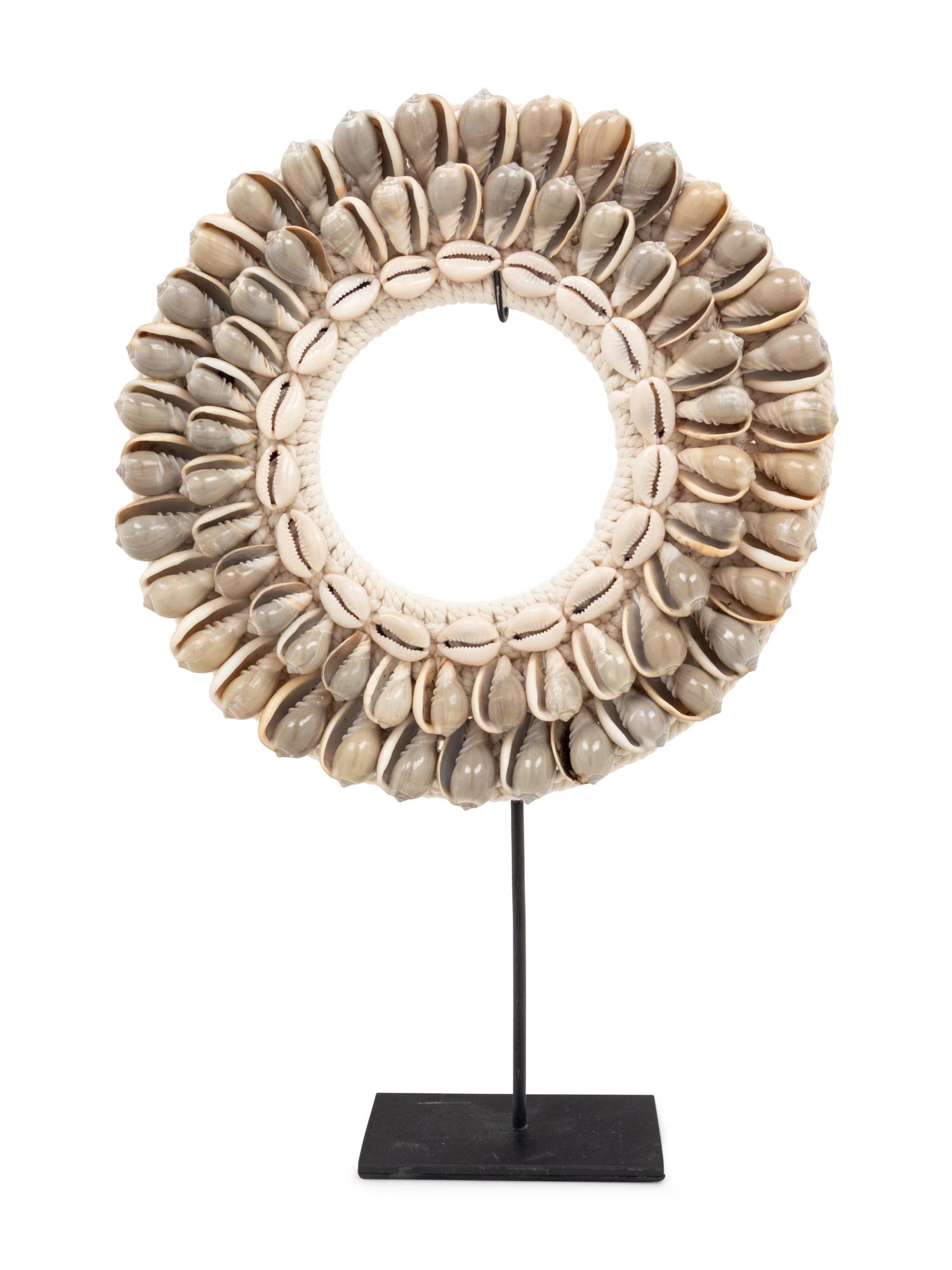 A Contemporary Cowrie Shell Ornament