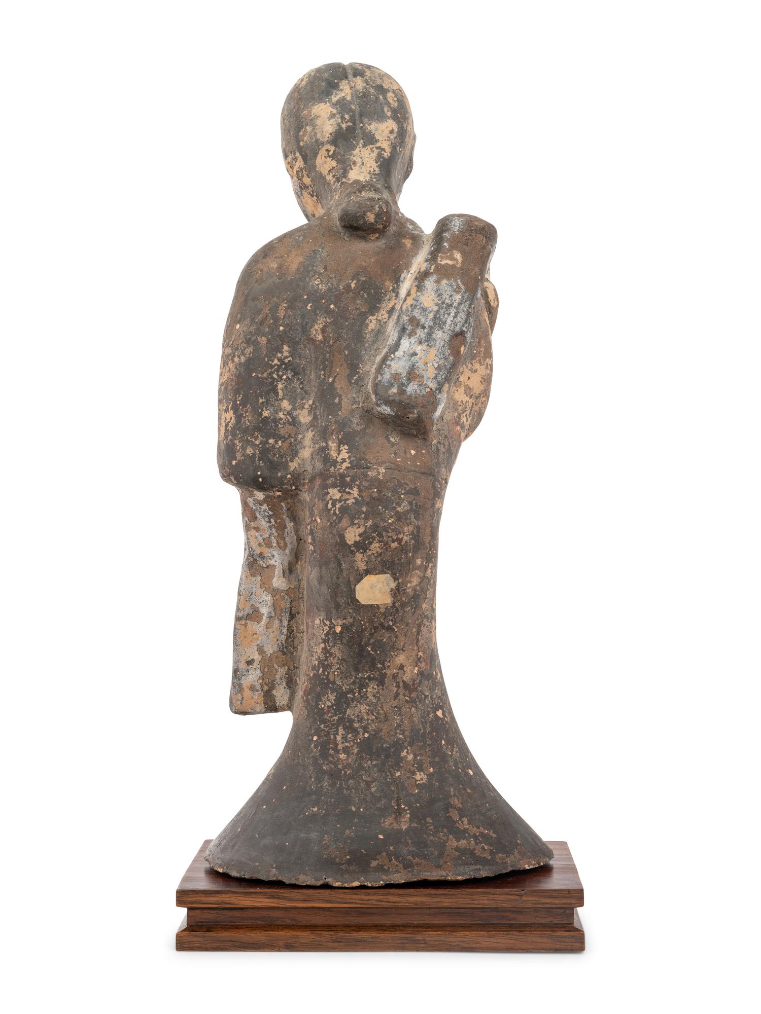 A Chinese Grey Pottery Figure of a Court Lady