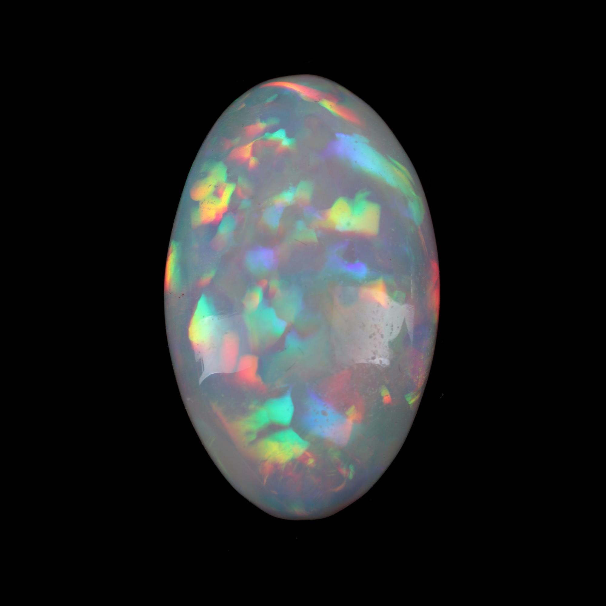A Large Unmounted Oval-Shaped Opal Cabochon
