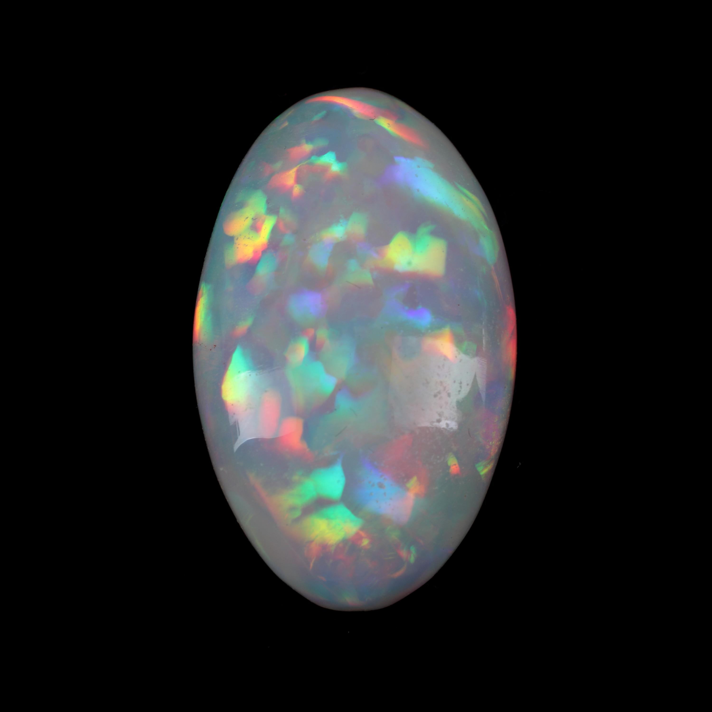 A Large Unmounted Oval-Shaped Opal Cabochon