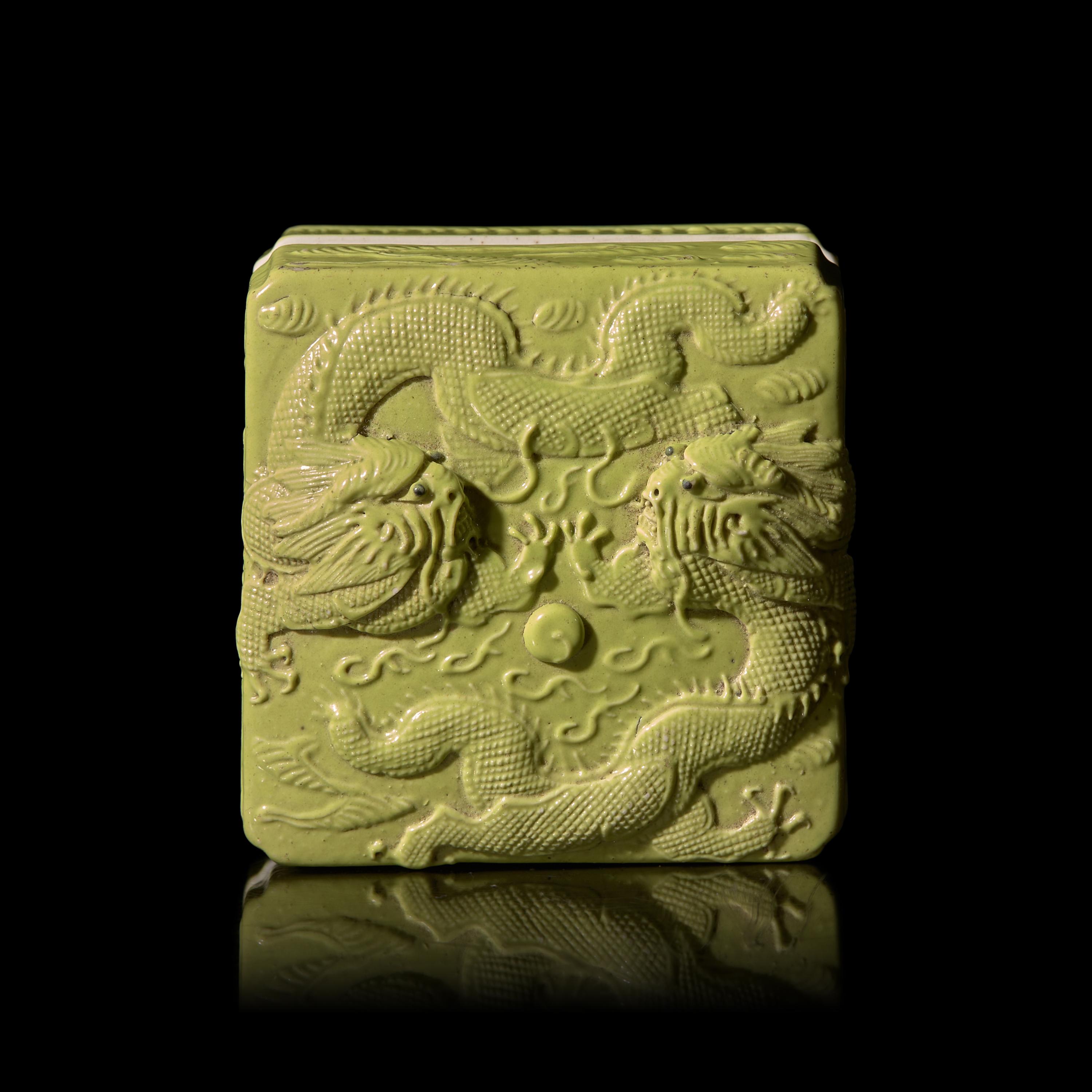 A Chinese Lime-Green Glazed Porcelain 'Dragons' Square Seal Paste Box and Cover, Late Qing Dynasty, Wang Bingrong Impressed Seal Mark 清晚期 王炳榮款檸檬綠釉模印雕二龍戲珠紋方型蓋盒