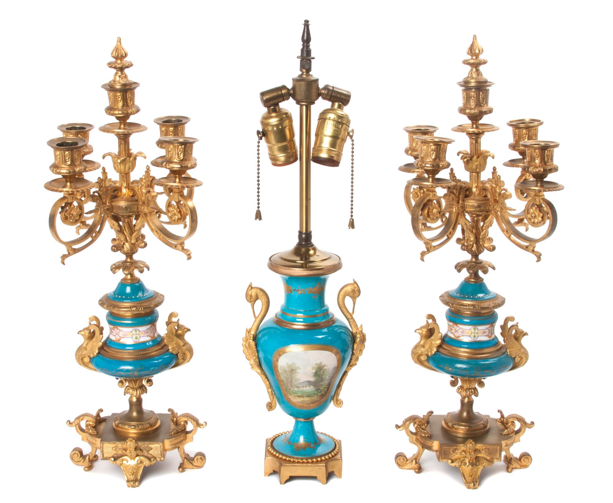 A Sevres Style Gilt Bronze Mounted Porcelain Garniture Height of tallest 20 1/4 inches.