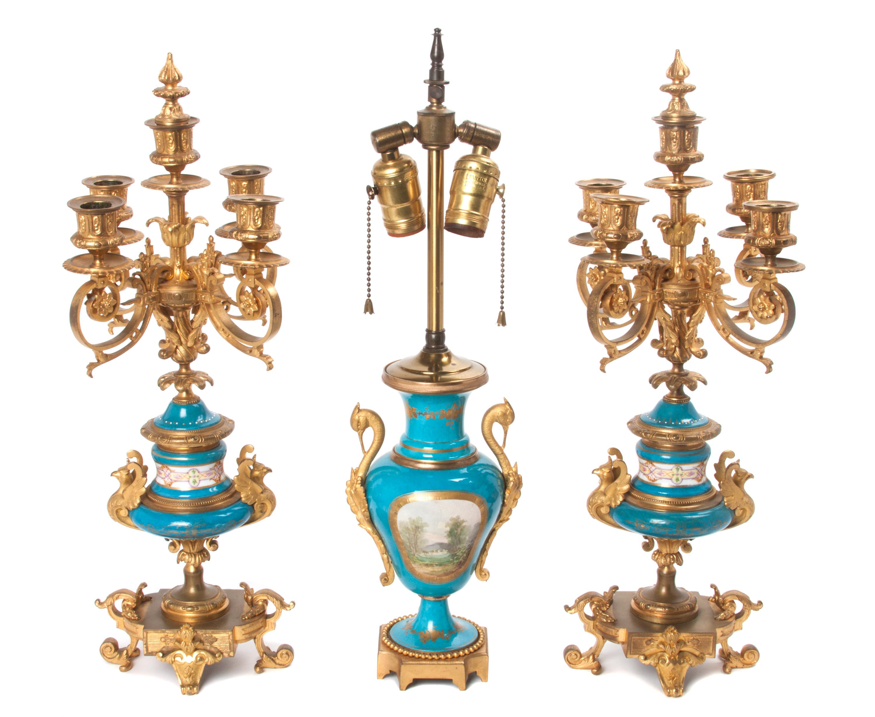 A Sevres Style Gilt Bronze Mounted Porcelain Garniture Height of tallest 20 1/4 inches.