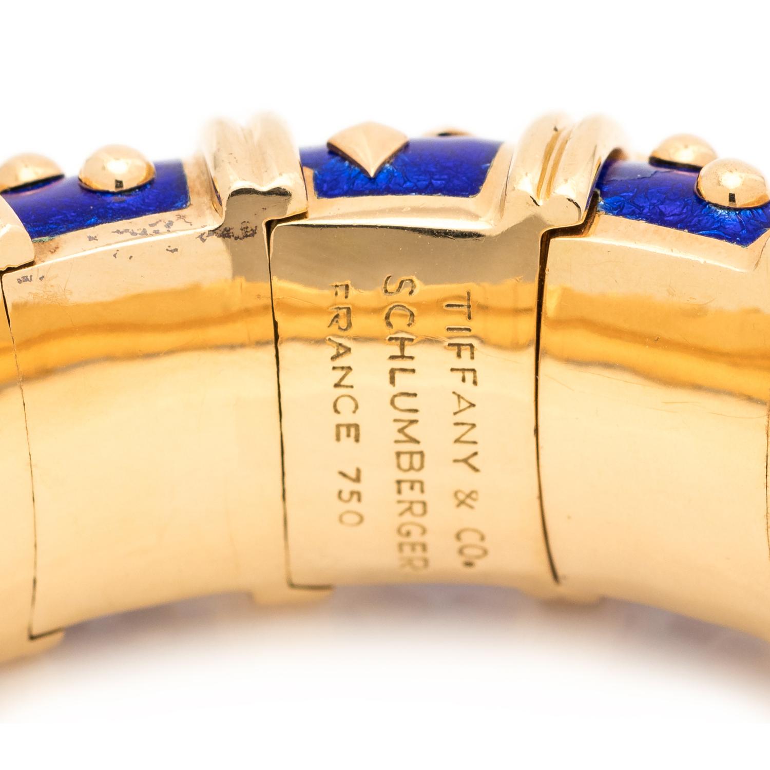 TIFFANY & CO., SCHLUMBERGER, YELLOW GOLD AND ENAMEL 'DOT LOSANGE' BANGLE BRACELET
