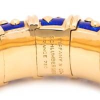 TIFFANY & CO., SCHLUMBERGER, YELLOW GOLD AND ENAMEL 'DOT LOSANGE' BANGLE BRACELET