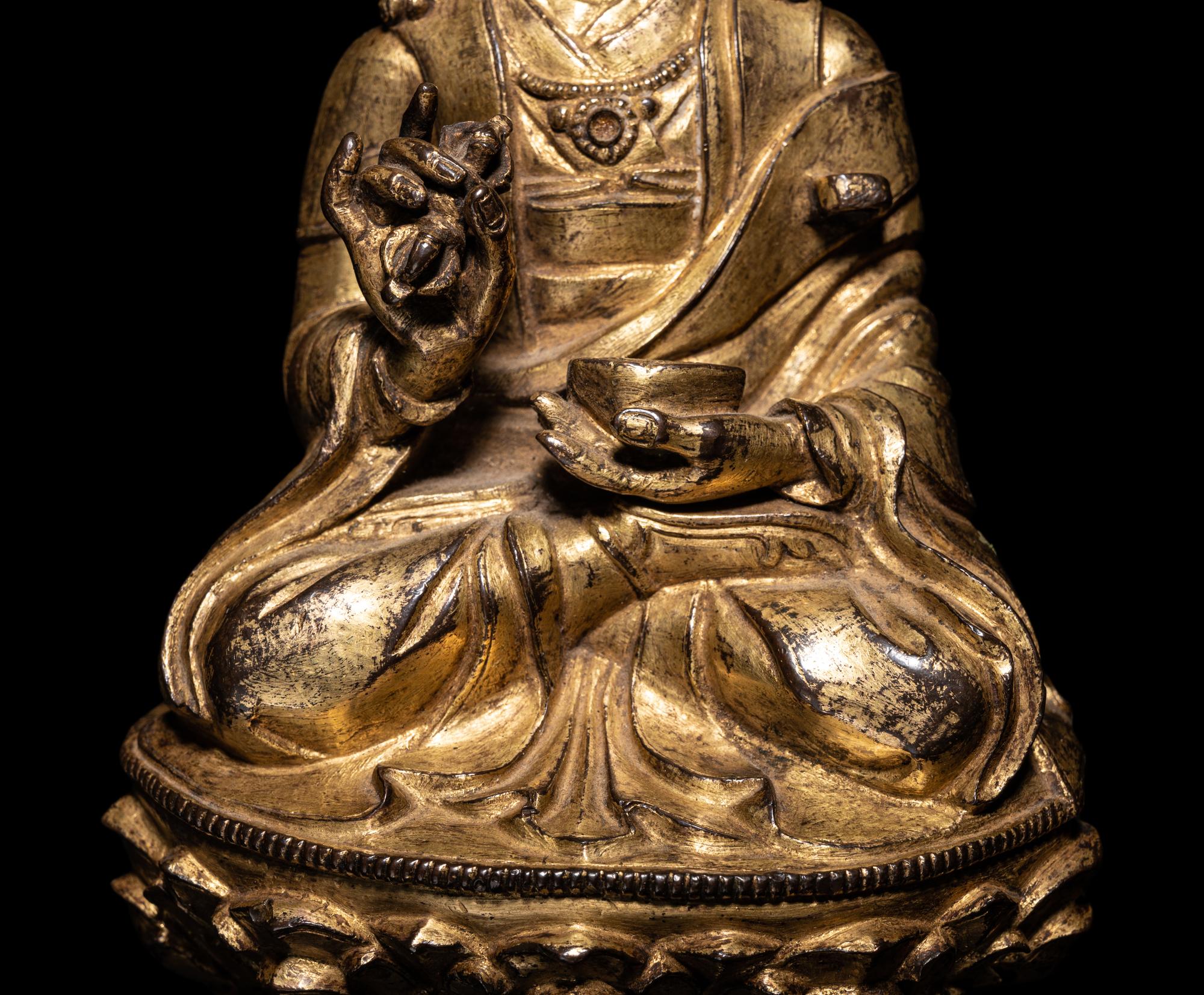A Tibetan Gilt Bronze Figure of a Seated Karmapa