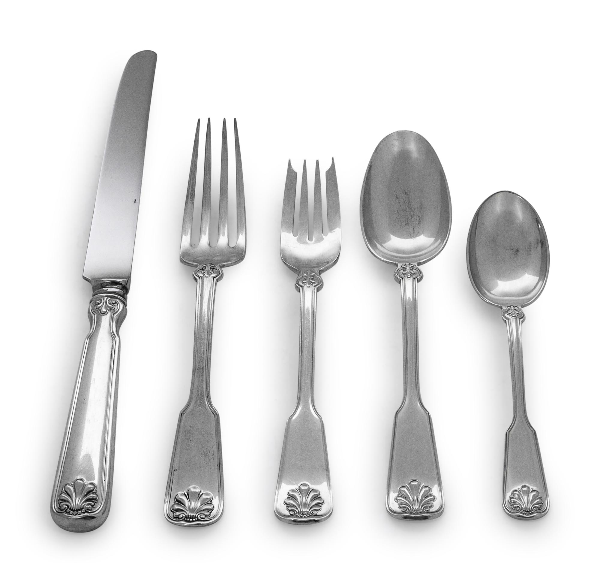 in the Shell and Thread pattern, comprising: 12 dinner knives with stainless steel blades 12 dinner forks 12 salad forks 12 tablespoons 14 teaspoons 12 cocktail forks 12 butter spreaders with stainless steel blades 2 serving forks 2 serving spoons 1 gravy ladle 91 pieces total.