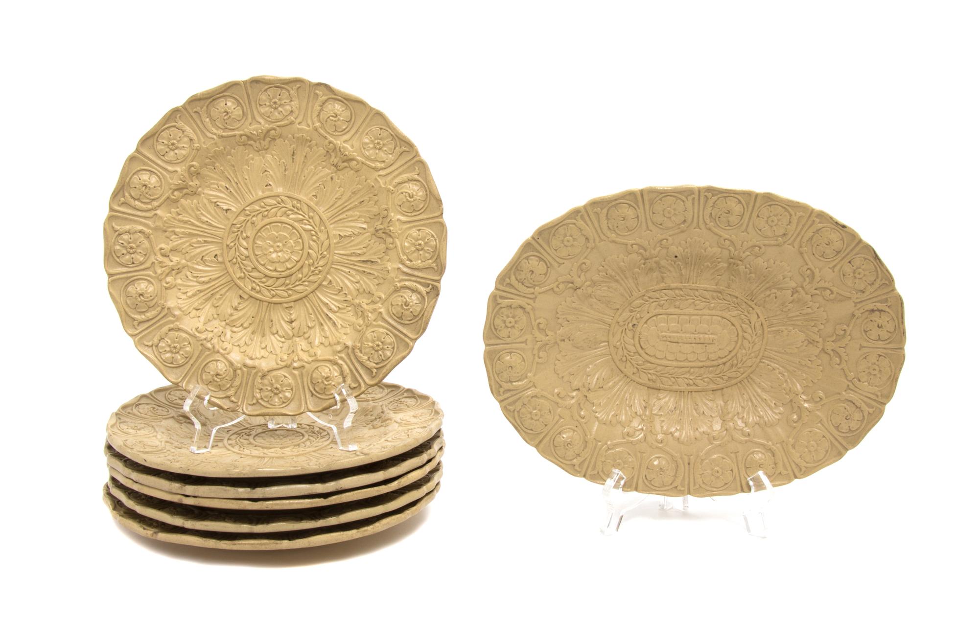 A Collection of Seven English Creamware Plates Length of longest 9 3/4 inches.