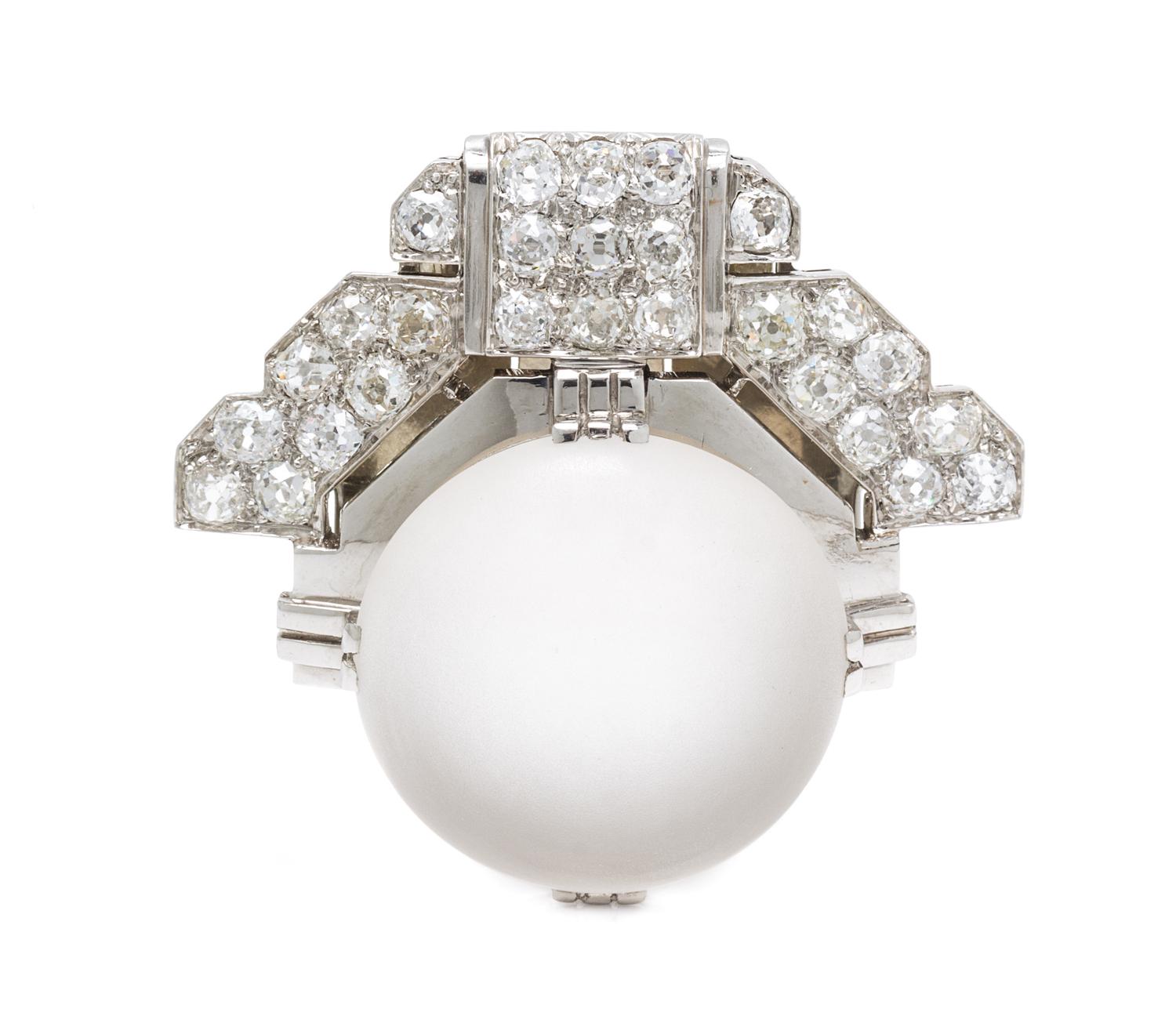 An Art Deco Platinum, Rock Crystal and Diamond Clip Brooch, 15.10 dwts.