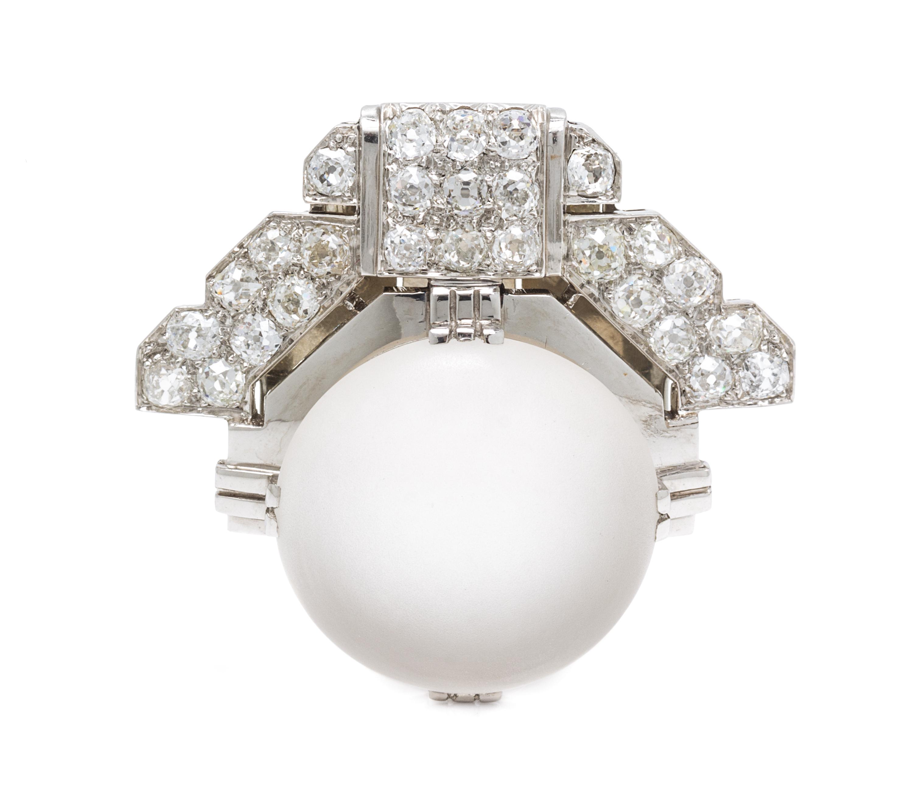 An Art Deco Platinum, Rock Crystal and Diamond Clip Brooch, 15.10 dwts.