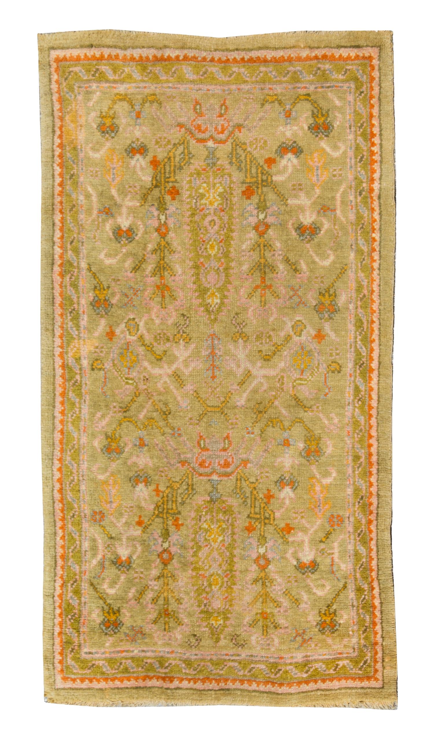 An Oushak Rug 5 feet 3 inches x 2 feet 9 inches.