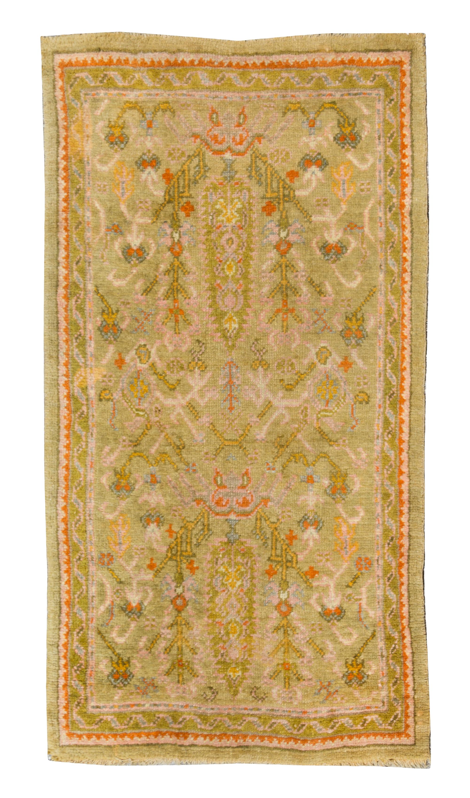 An Oushak Rug 5 feet 3 inches x 2 feet 9 inches.