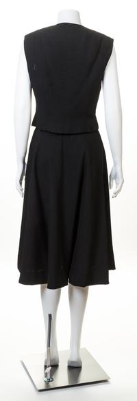 A Pauline Trigere Black Sleeveless Vest and Skirt Set, No size.
