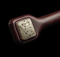 A Chinese Celadon Jade Inset Hardwood Ruyi Scepter