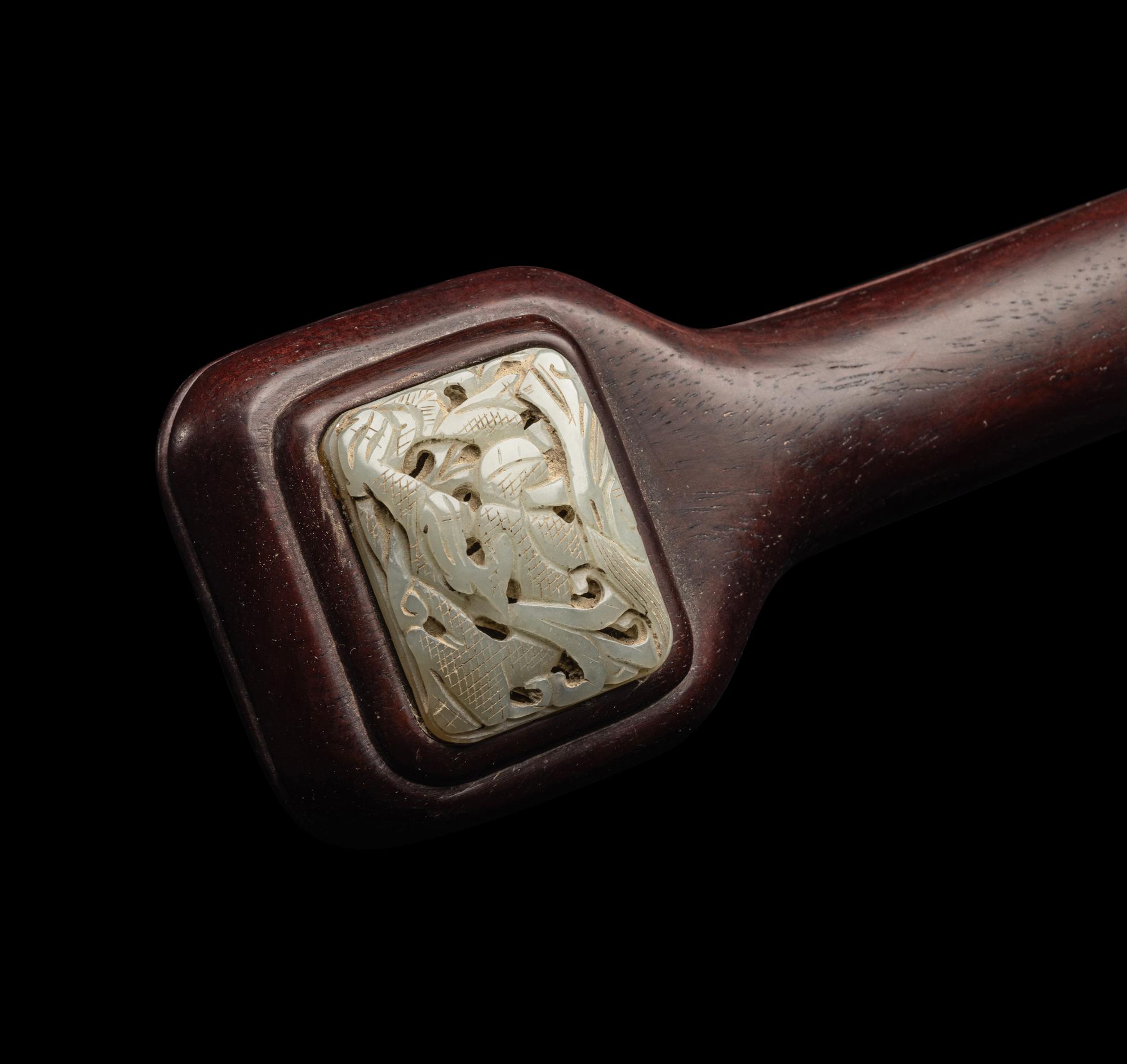 A Chinese Celadon Jade Inset Hardwood Ruyi Scepter