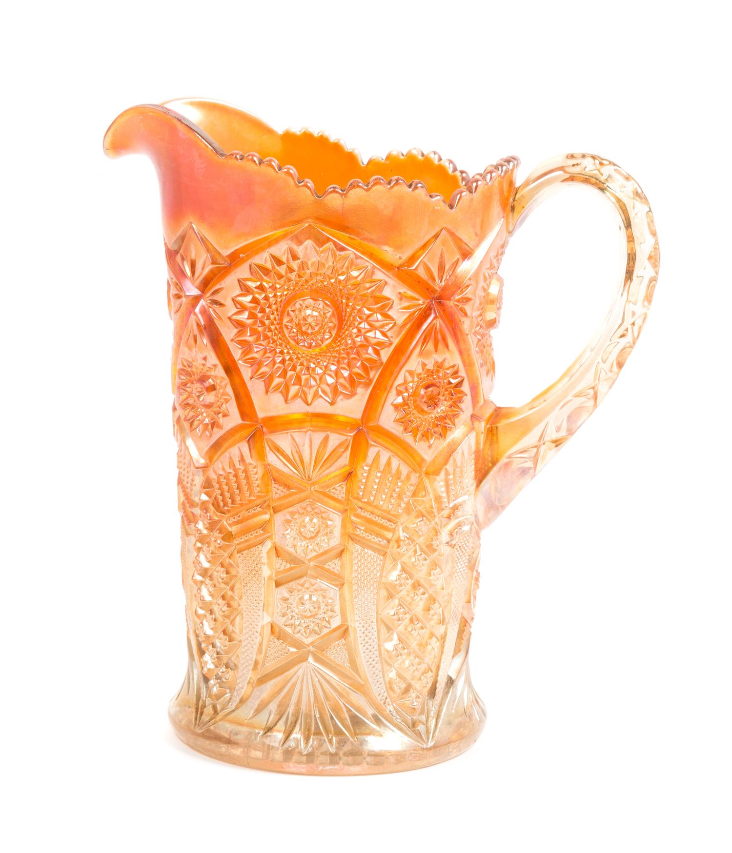 A Carnival Glass Pitcher Height 9 1/2 inches.