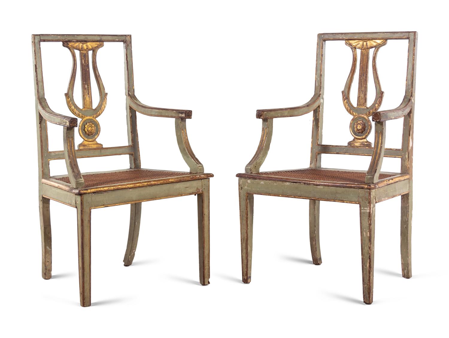 A Pair of Italian Painted and Parcel Gilt Lyre-Back Armchairs