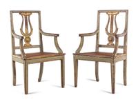 A Pair of Italian Painted and Parcel Gilt Lyre-Back Armchairs