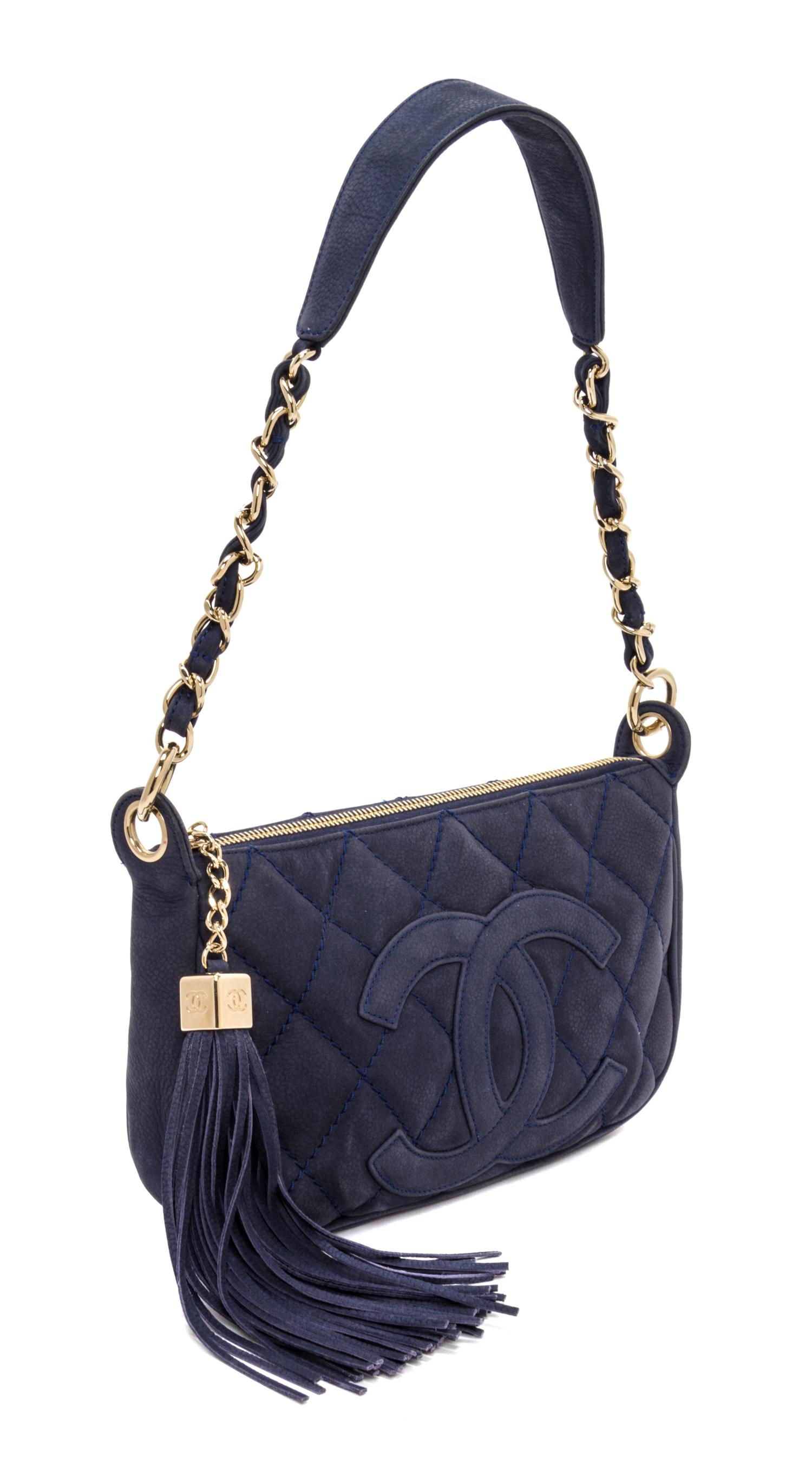 A Chanel Blue Suede Quilted Shoulder Bag, 10" x 6" x 1.5".