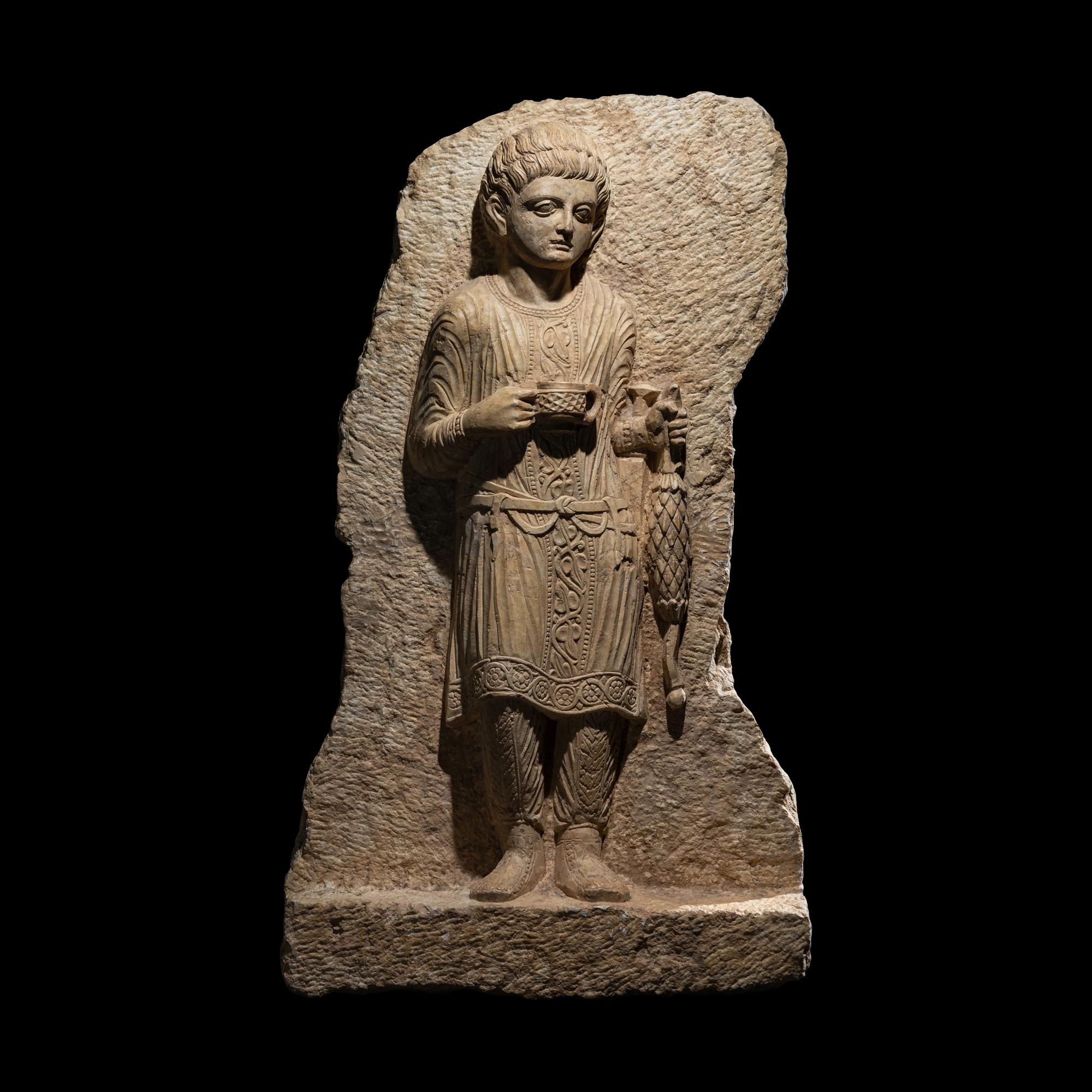 A Palmyrene Limestone Relief Fragment of a Youth