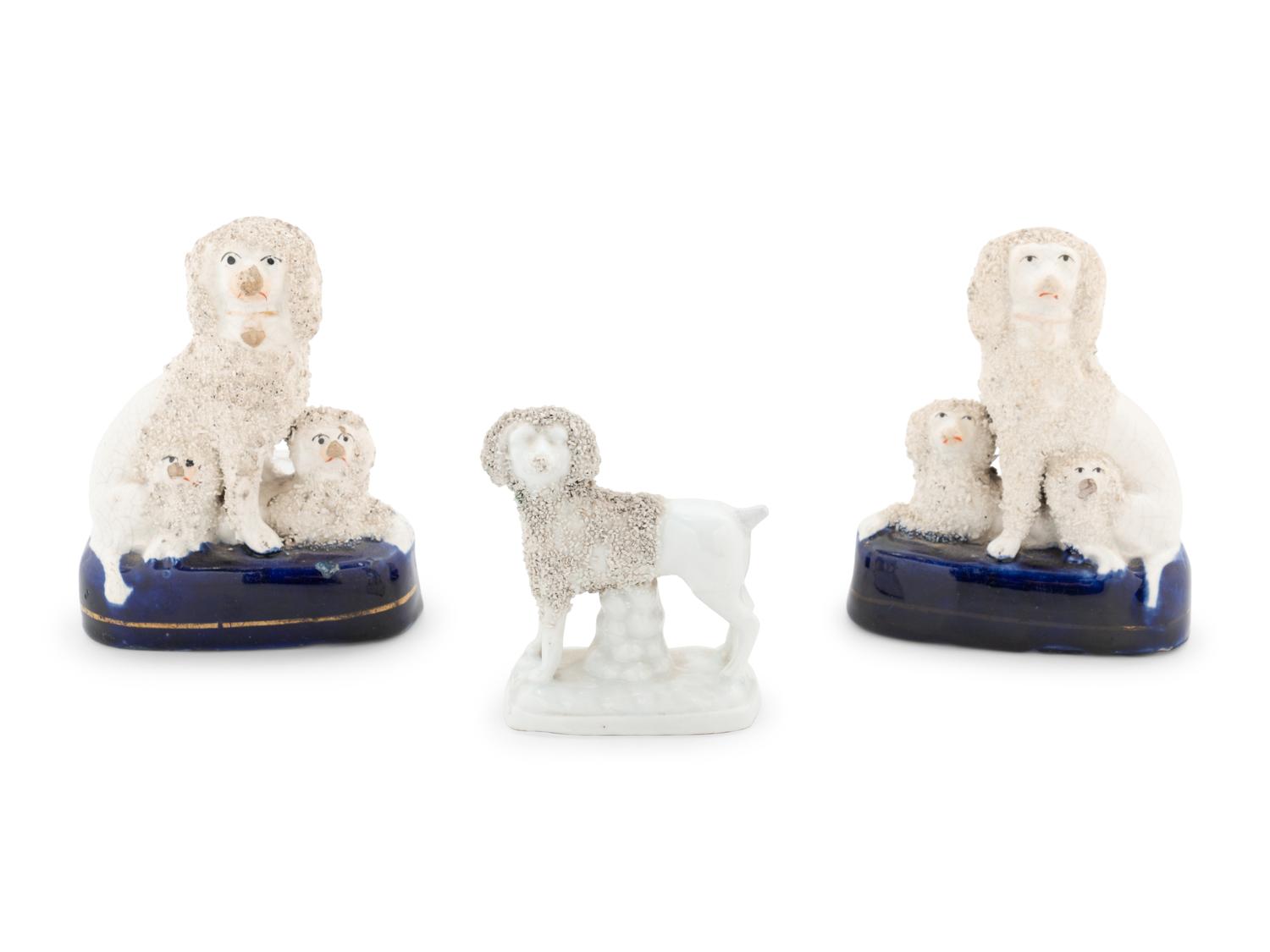 A Collection of Nine Staffordshire Glazed Poodles