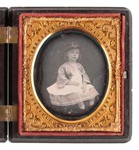 [CIVIL WAR]. Likely pre-war sixth plate daguerreotype portrait of a young girl wearing a kepi.