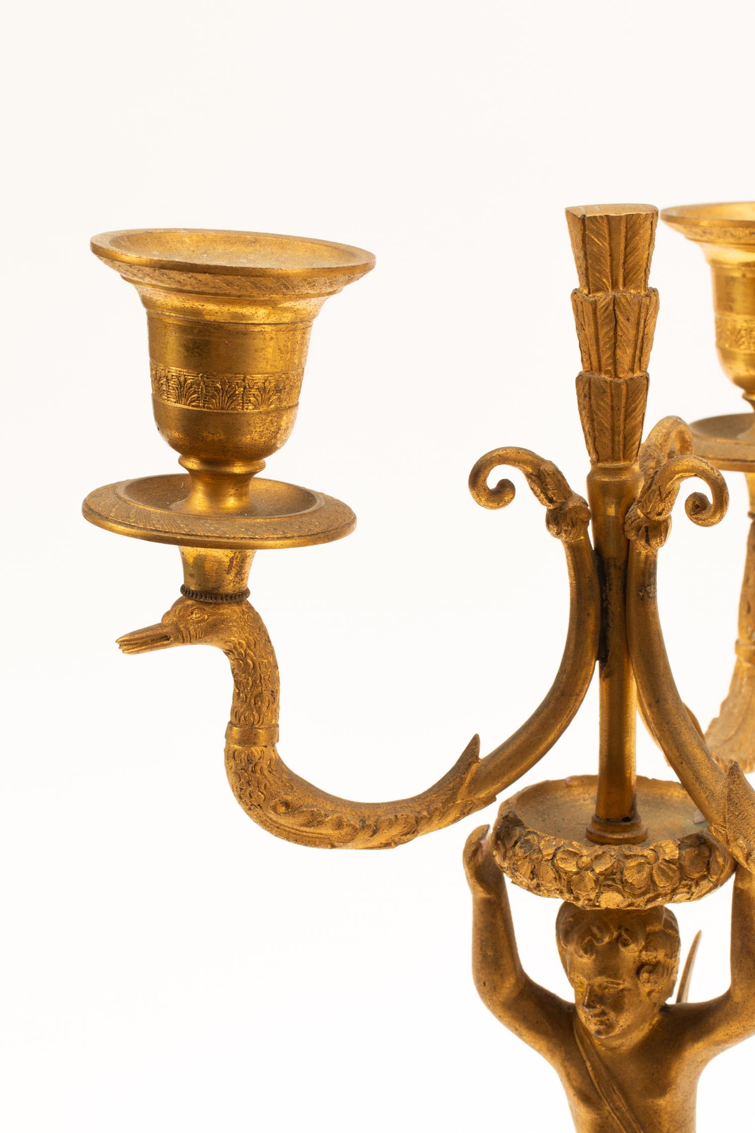 A Pair of Charles X Gilt Bronze Three-Light Candelabra