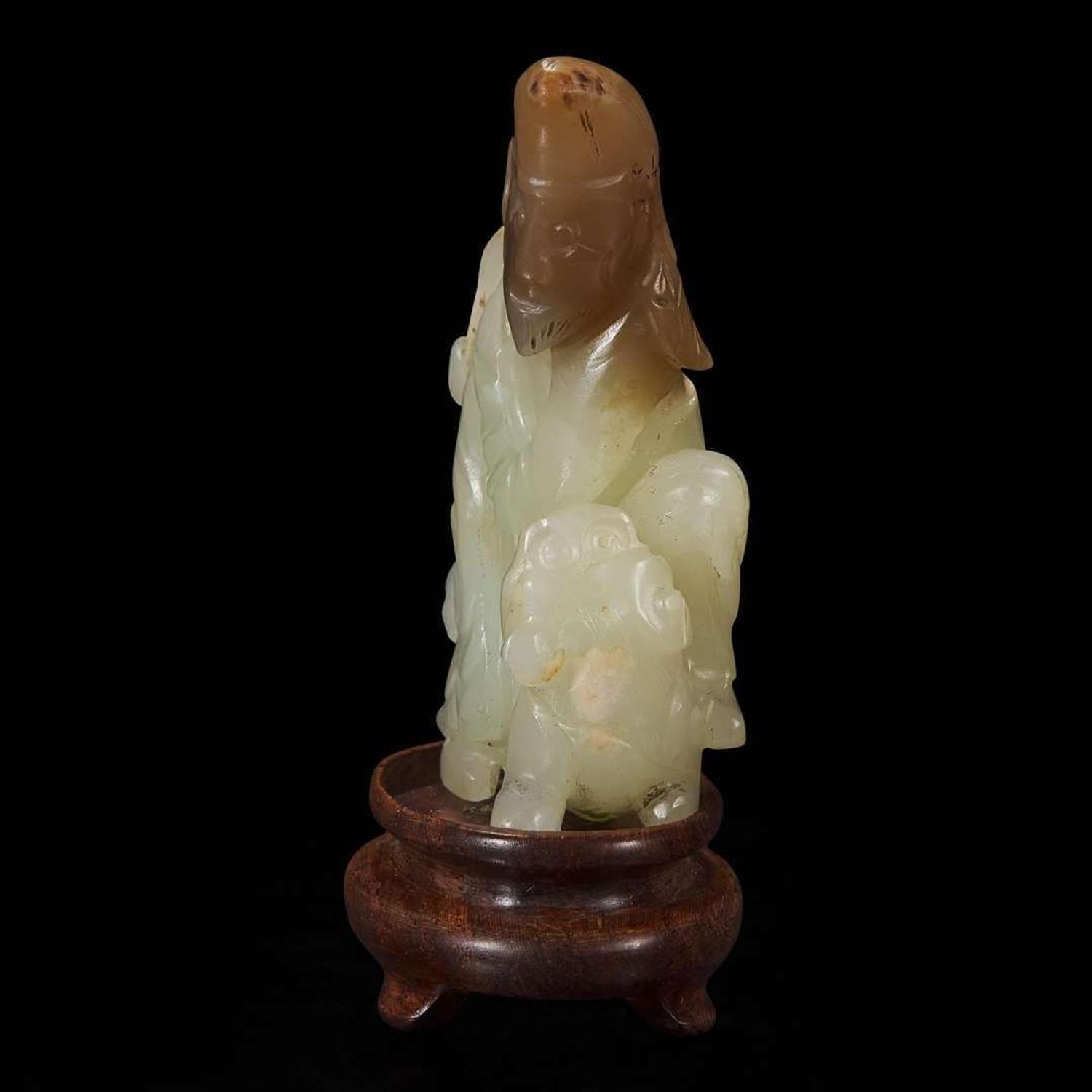 A rare Chinese jade carving of a foreigner and mythical beast 胡人戏兽玉雕 Tang dynasty or later ????