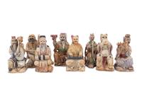 A Set of Eight Chinese Painted Soapstone Figures of Daoist Immortals