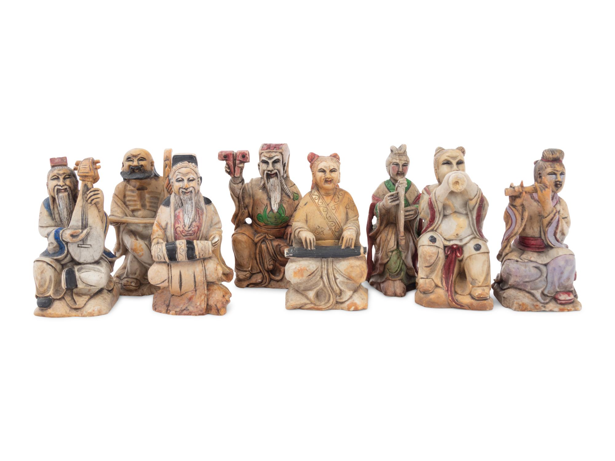 A Set of Eight Chinese Painted Soapstone Figures of Daoist Immortals