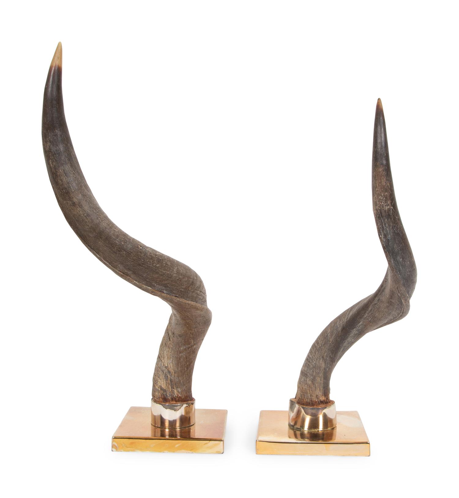 A Pair of Anthony Redmile Impala Horns Mounted on Bronzed Metal Bases