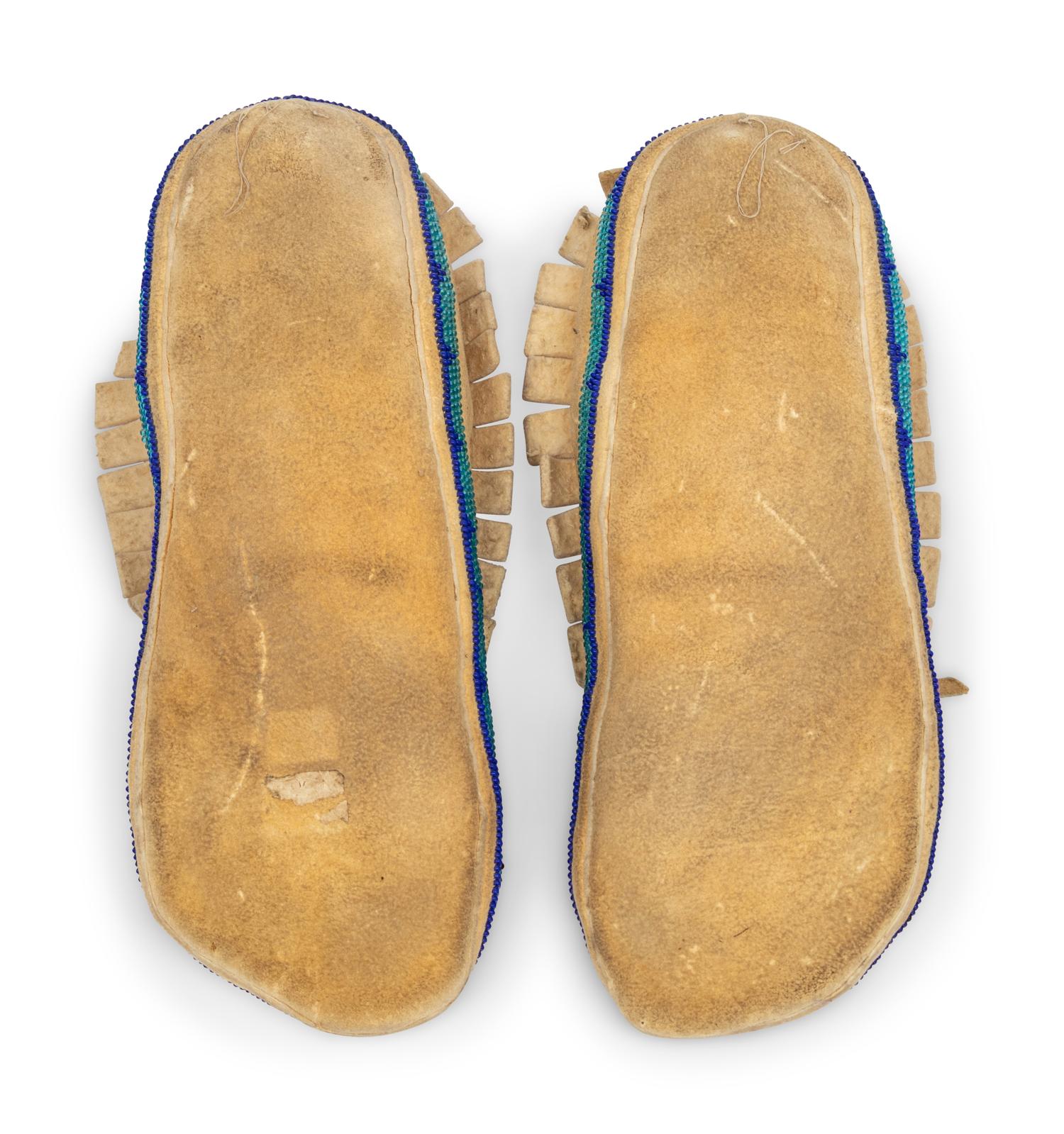 A Pair of Plateau Beaded Hide Moccasins