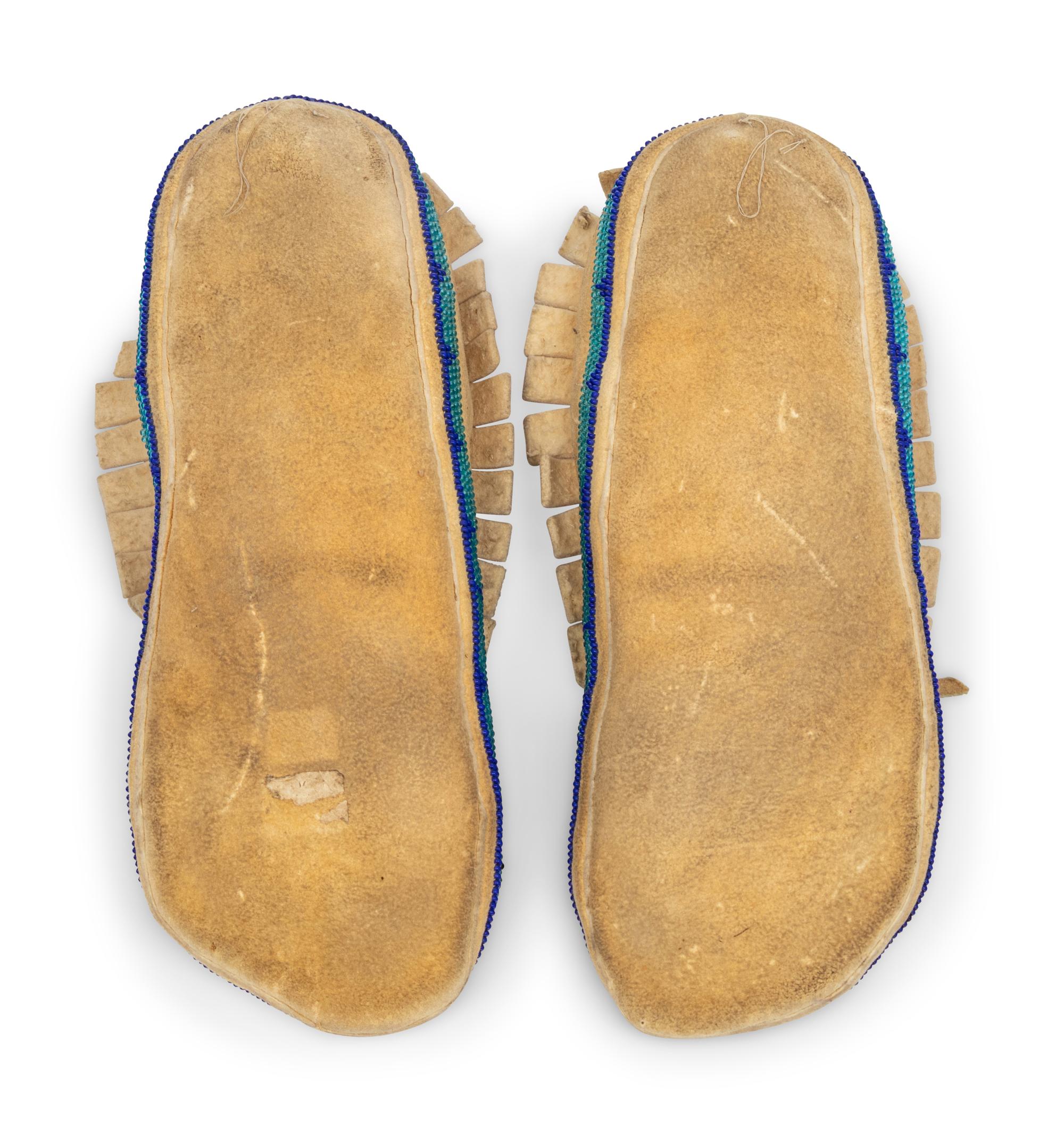 A Pair of Plateau Beaded Hide Moccasins
