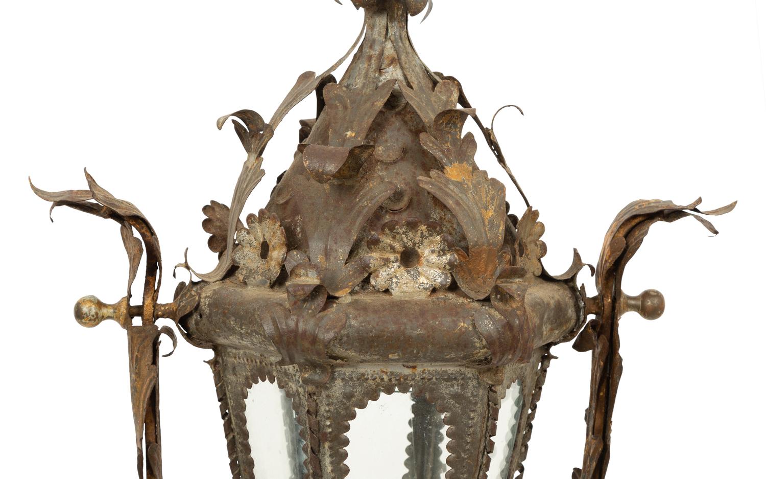 An Italian Tole Swinging Lantern on a Giltwood Stand