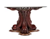 A Continental Carved and Parcel Gilt Center Table Height 29 1/4 x diameter of top 48 inches.