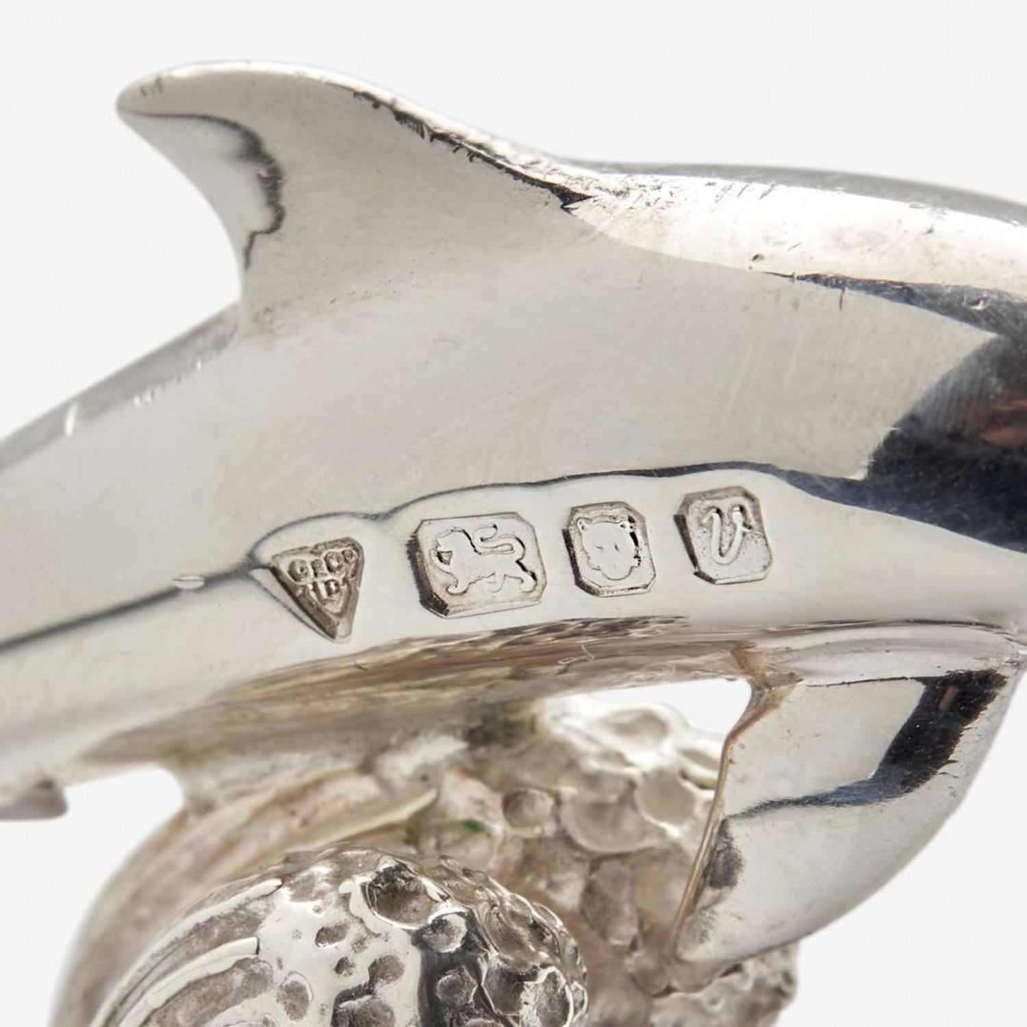 Garrard & Co. Ltd. (English, active 1722-Present) Set of Twelve Sterling Silver Dolphin-Form Place Card Holders, UK, 1995