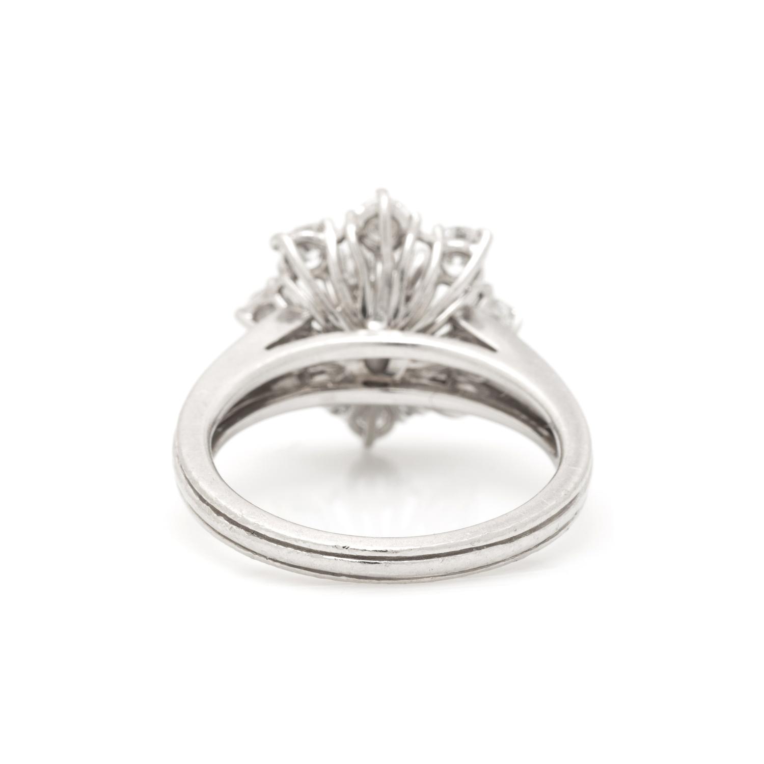 CARTIER, PLATINUM AND DIAMOND RING