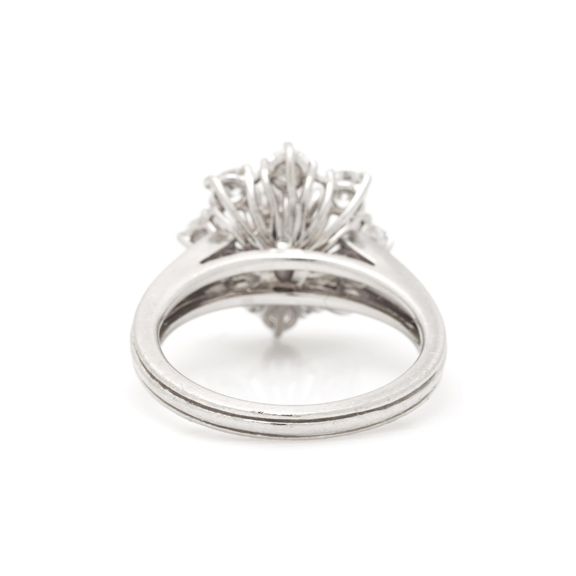 CARTIER, PLATINUM AND DIAMOND RING