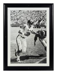 A Group of Four Large Scale Photographs of Mike Ditka as Player Formerly Displayed at Mike Ditka’s Restaurant
