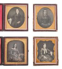 [EARLY PHOTOGRAPHY]. 14 sixth plate daguerreotypes of women and girls with curled and braided hair.