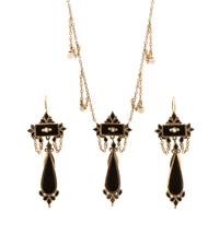 A Victorian Yellow Gold, Onyx and Seed Pearl Mourning Jewelry Demi Parure, 16.80 dwts.