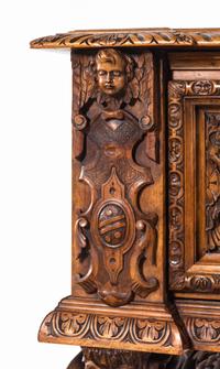 An Italian Renaissance Revival Carved Walnut Cassone on Stand