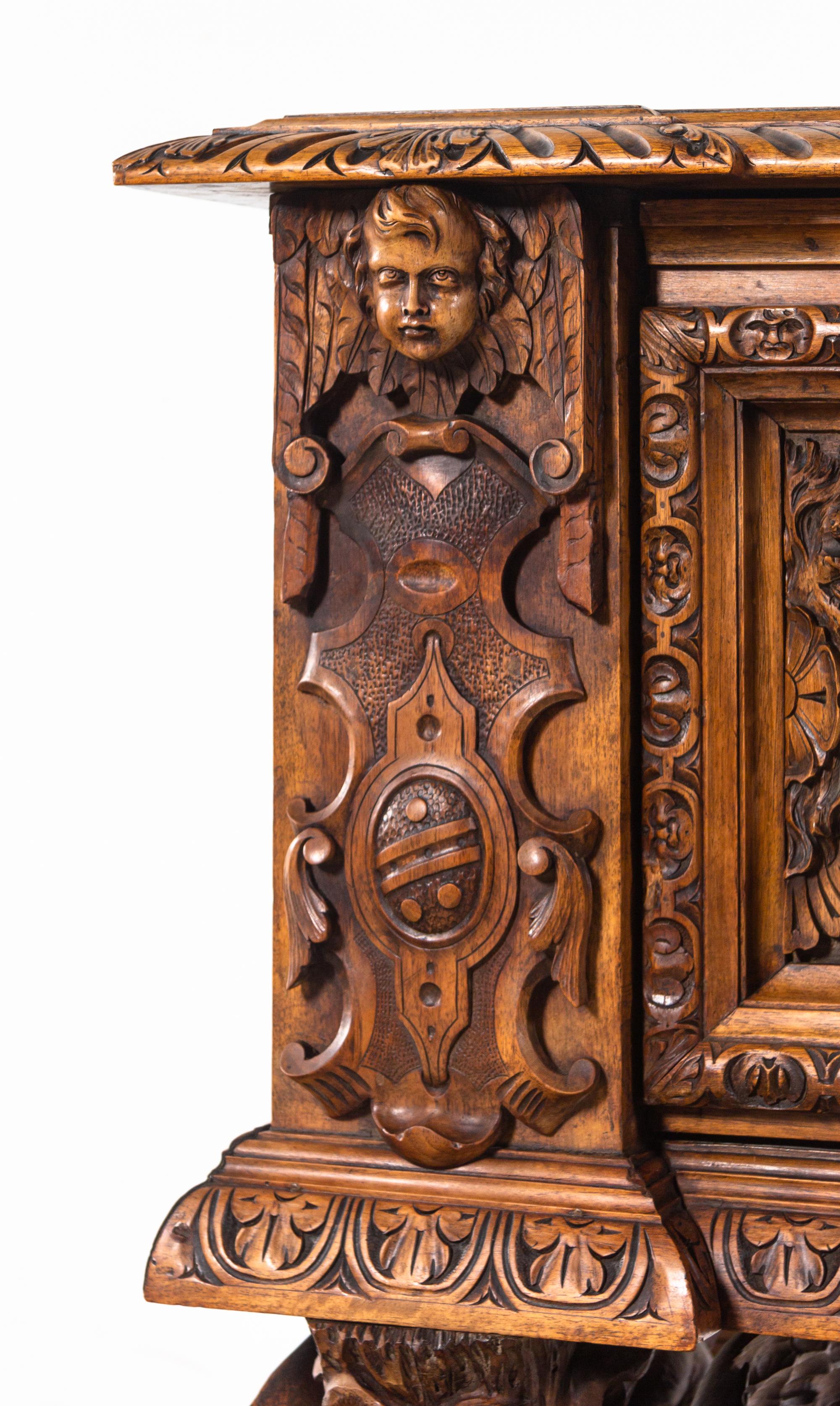 An Italian Renaissance Revival Carved Walnut Cassone on Stand