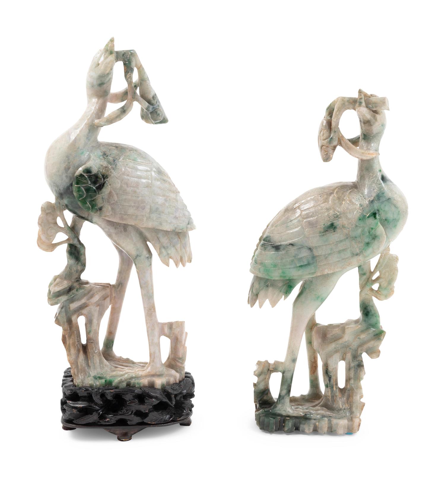 A Pair of Chinese Apple Green and White Jadeite Figures of Cranes