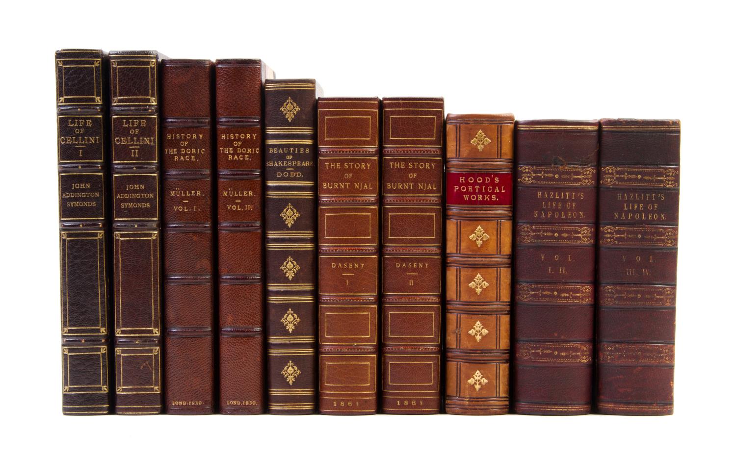(BINDINGS) A group of 10 leather-bound volumes.