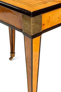 A Biedermeier Style Part-Ebonized Burlwood Dining Table
