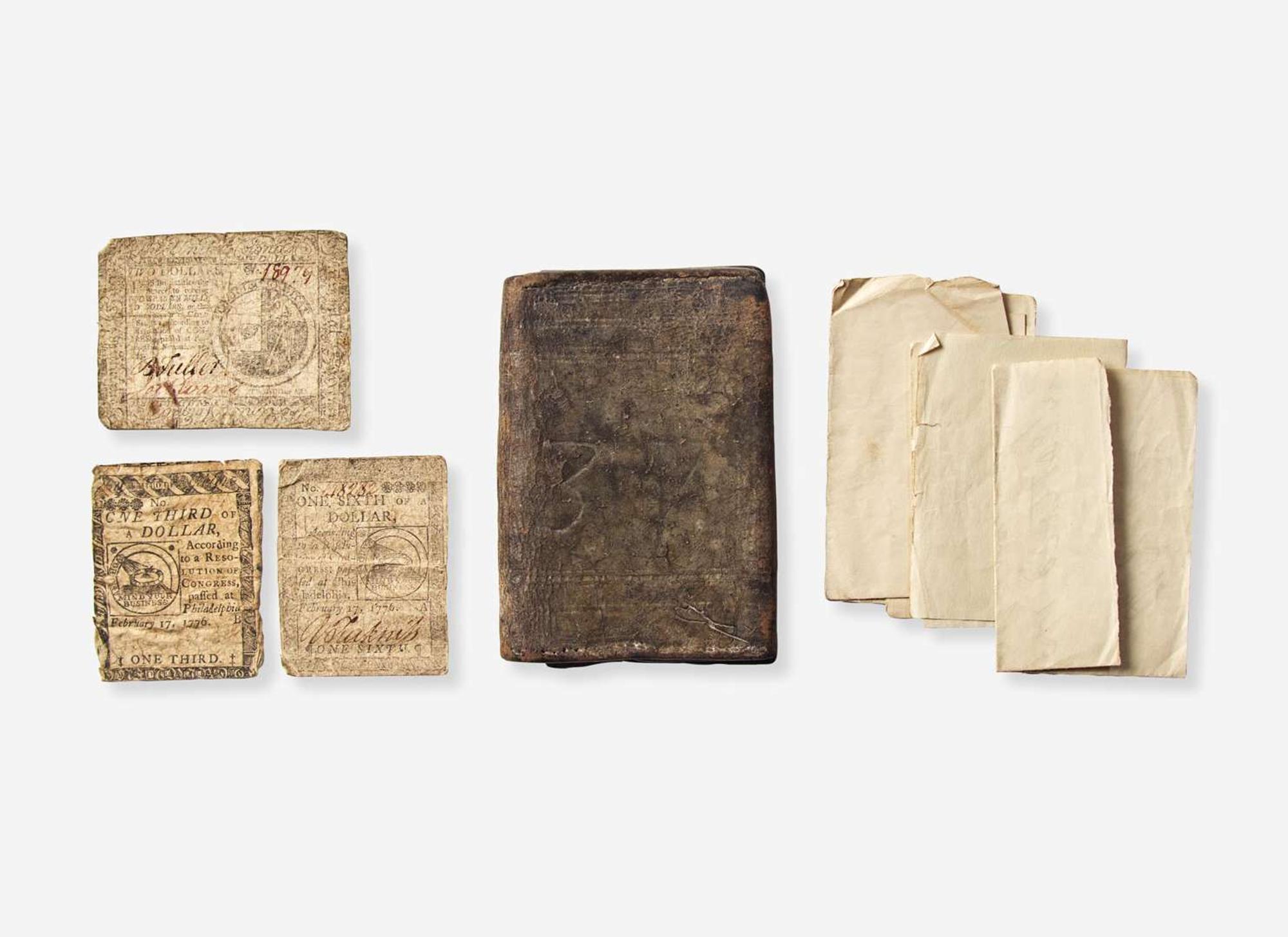 A tooled, dated and initialed leather pocketbook, belonging to Robert Morris, Sr. (1711-1750) and Robert Morris, Jr. (1734-1806), dated "1737"